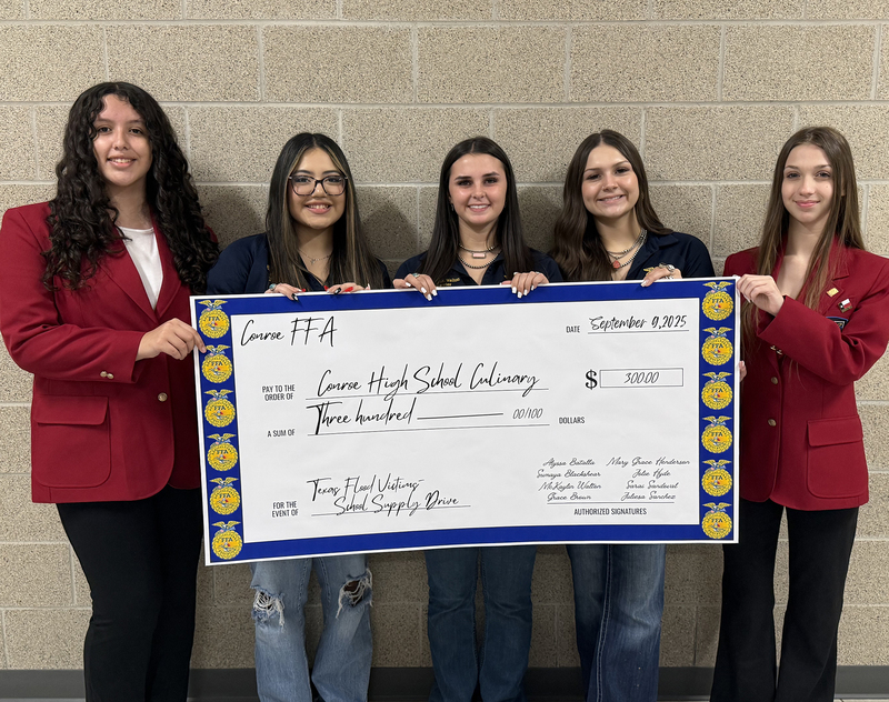 Students from Conroe High School with Check