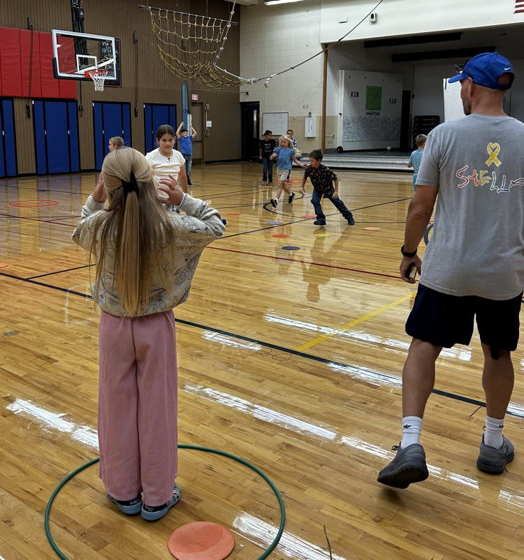 A student getting ready to throw a ball