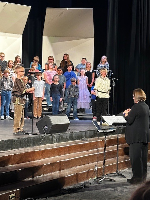 concert participants on stage