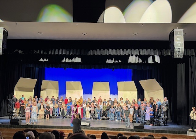 concert participants on stage