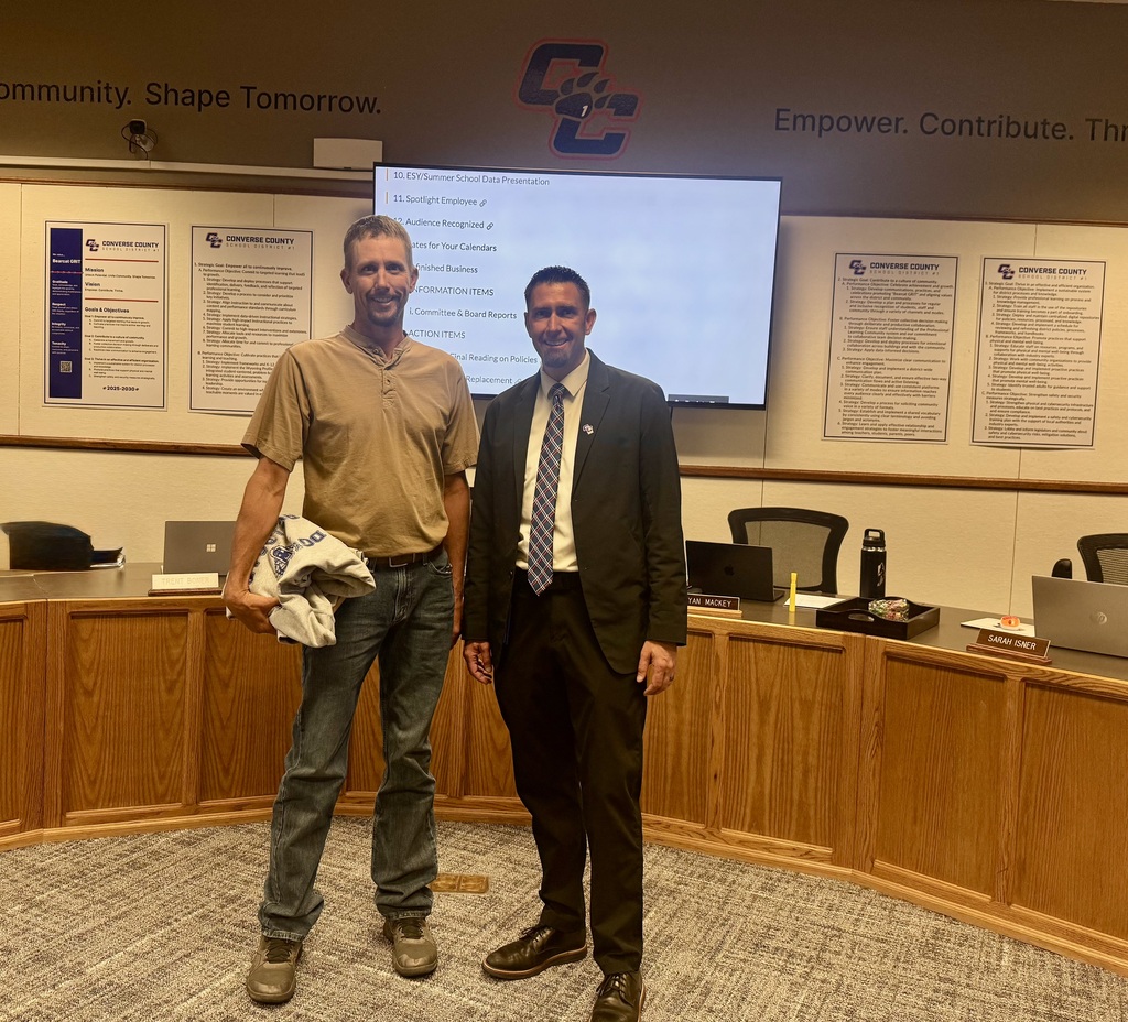 photo of superintendent and previous board member