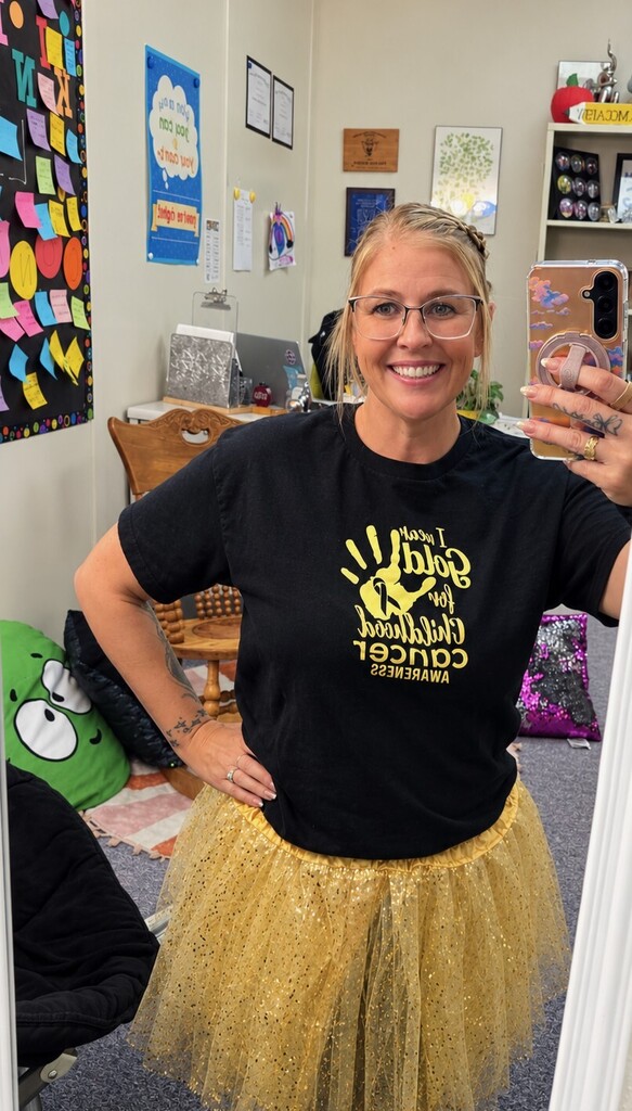 DIS/DUES staff dressed in gold