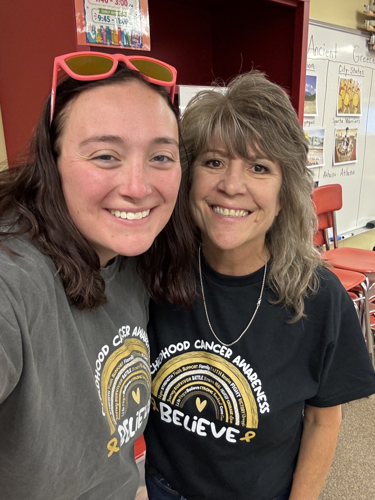 DIS/DUES staff dressed in gold