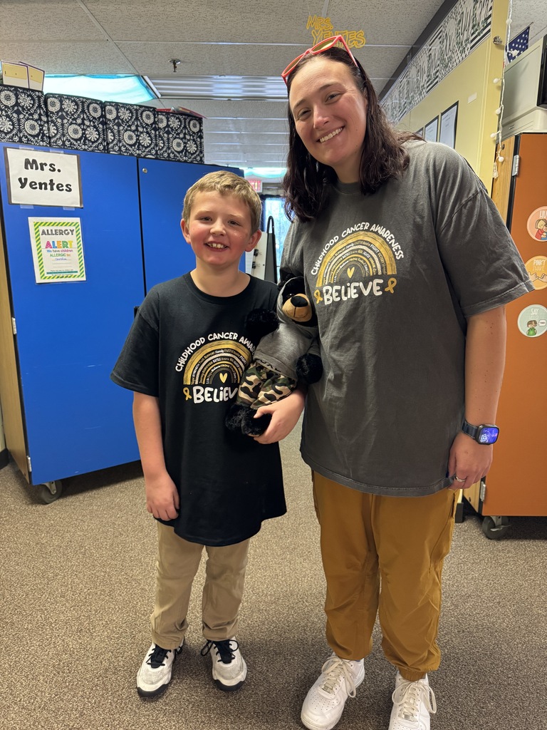 DIS/DUES staff dressed in gold