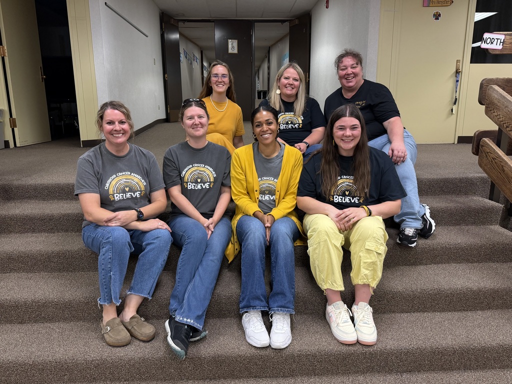 DIS/DUES staff dressed in gold