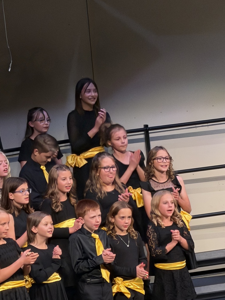 kids singing during a concert