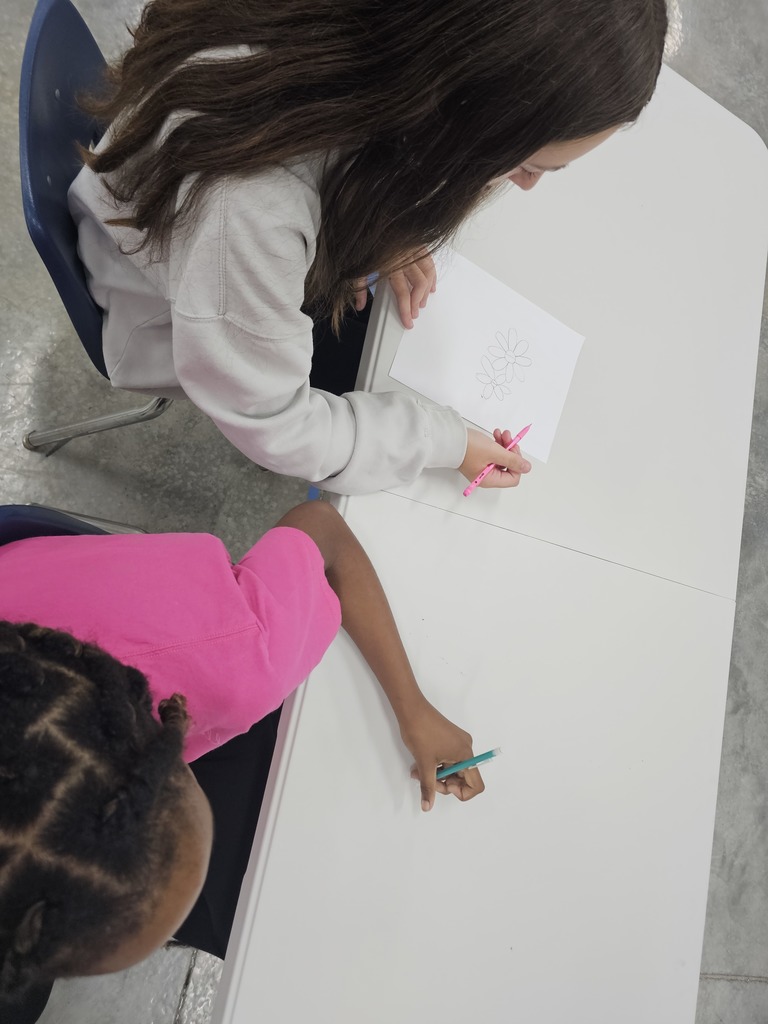 In Mr. German's health class, the students are learning how to communicate effectively. In this exercise, one student was describing what to draw and the other student was drawing!