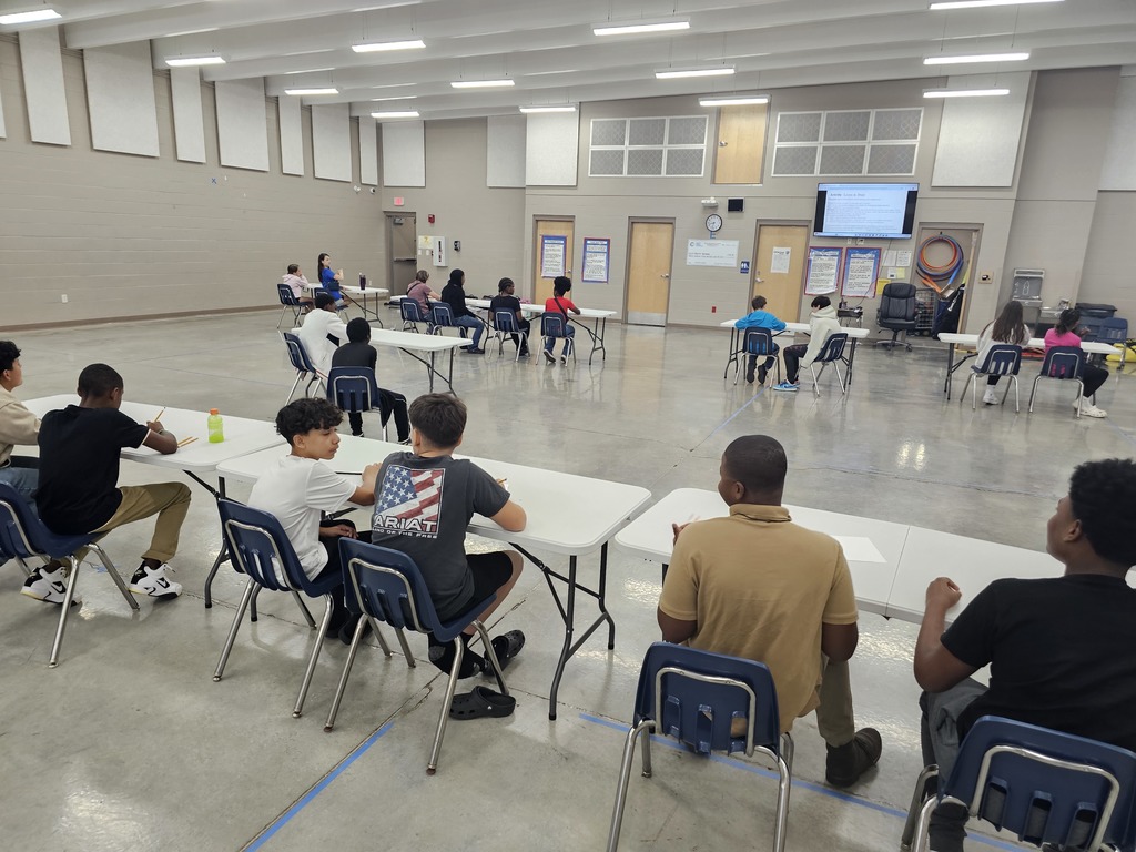 In Mr. German's health class, the students are learning how to communicate effectively. In this exercise, one student was describing what to draw and the other student was drawing!