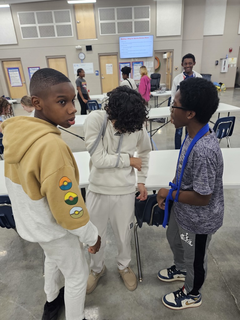 Coach German's 7th grade health class learned about basic first aid this week. They practiced creating makeshift slings and braces using cut up T-Shirts and hockey sticks.