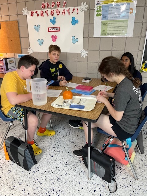 Mrs. Hunter's 7th Accelerated Sciences have been working with physical properties this week as they determined mass, volume, density, circumference, and height as they worked with some yummy and seasonal items. This was an opportunity for the students to demonstrate what they have learned during their Chemistry unit. Fun and great snacks were had by