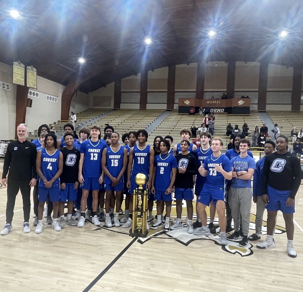 Basketball team with trophy