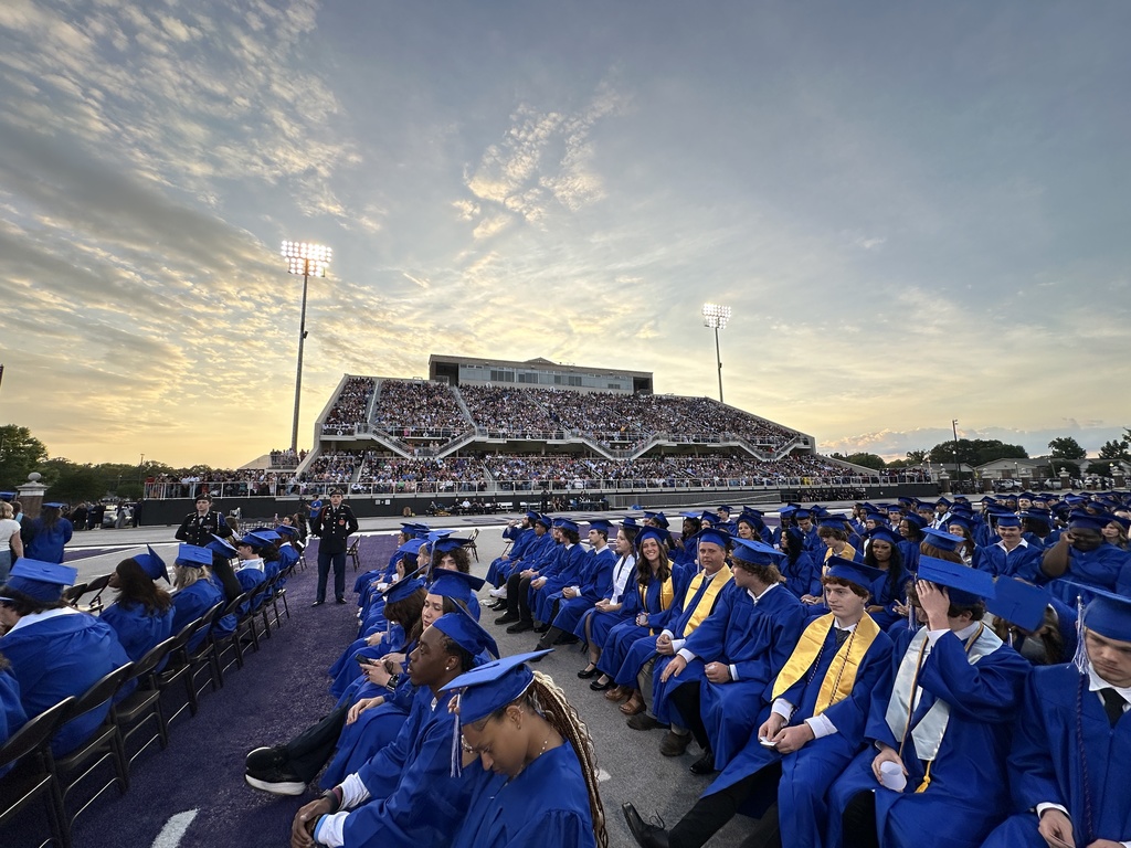 Estes stadium packed crowd and graduates