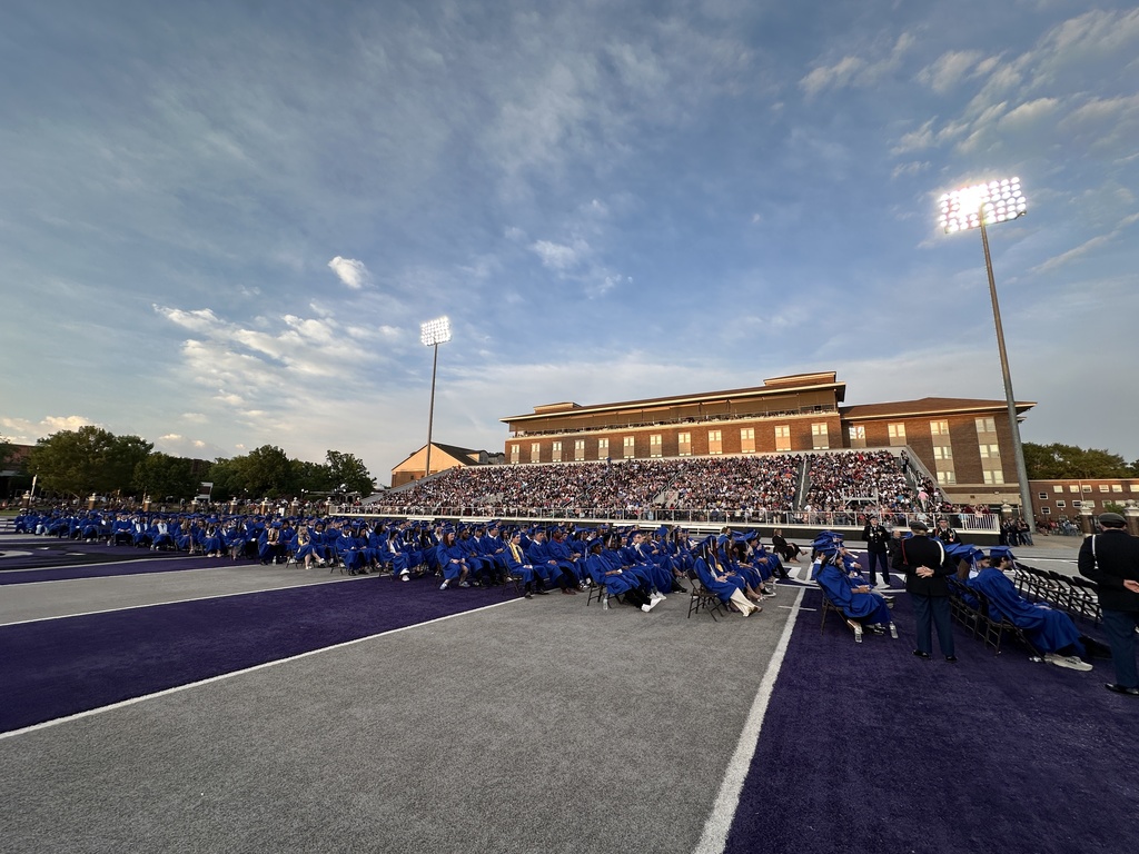 Estes stadium packed crowd and graduates