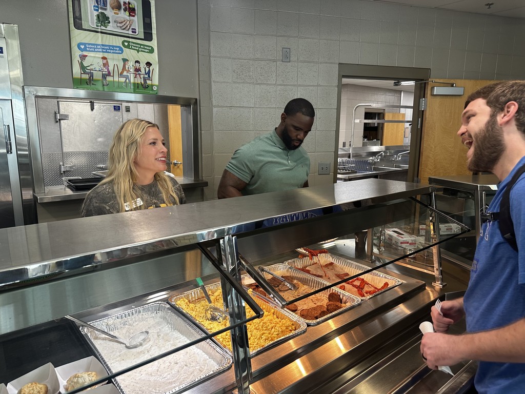Admin serving breakfast 