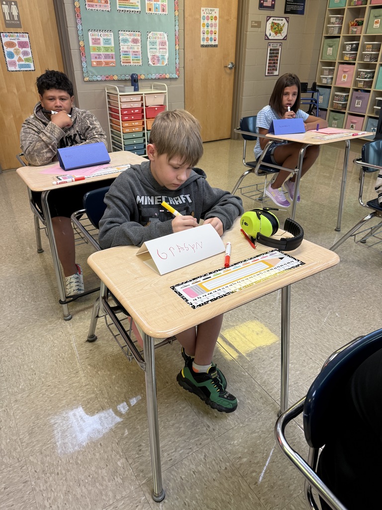 students working on a trifold