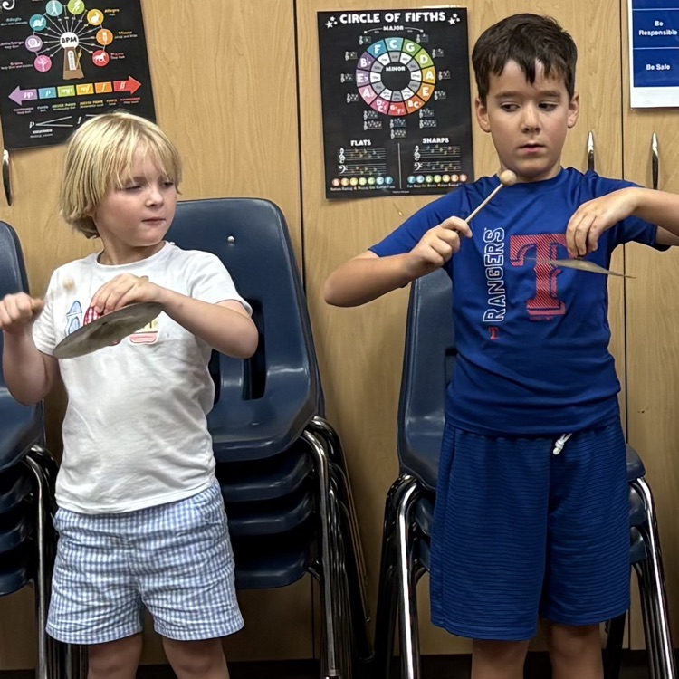 students playing cymbals