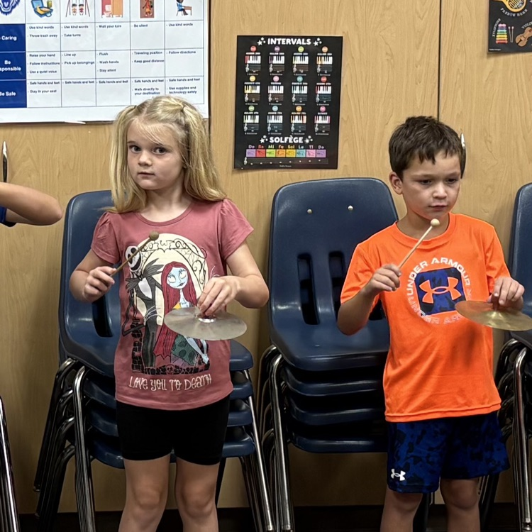 students playing cymbals