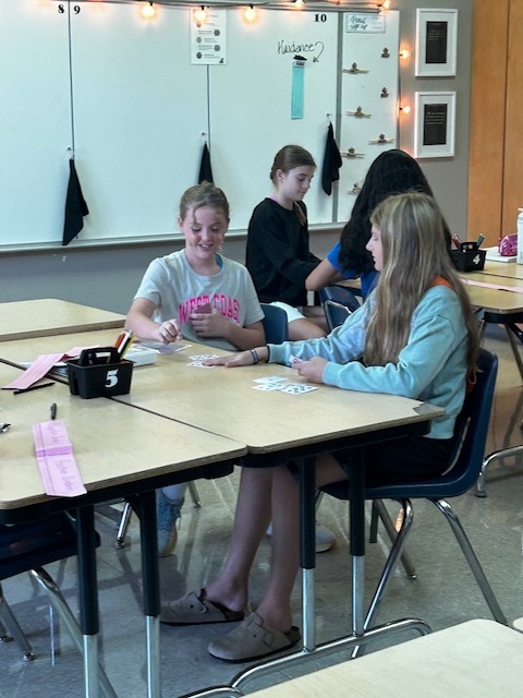 students playing math game