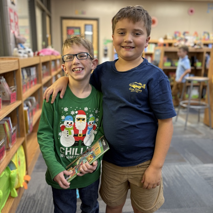 friends excited to check out library books