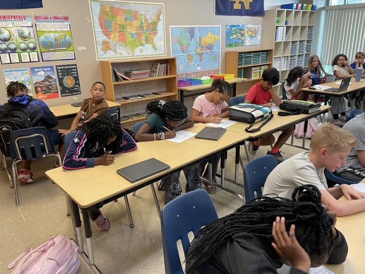 students reading and writing