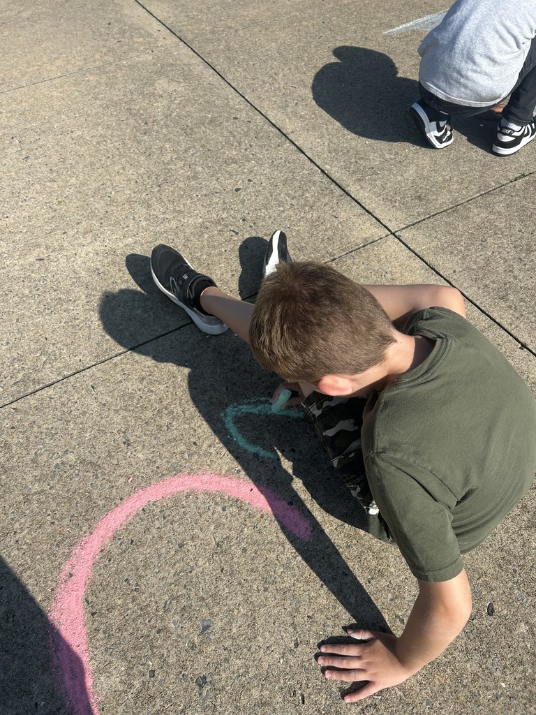 students using sidewalk chalk