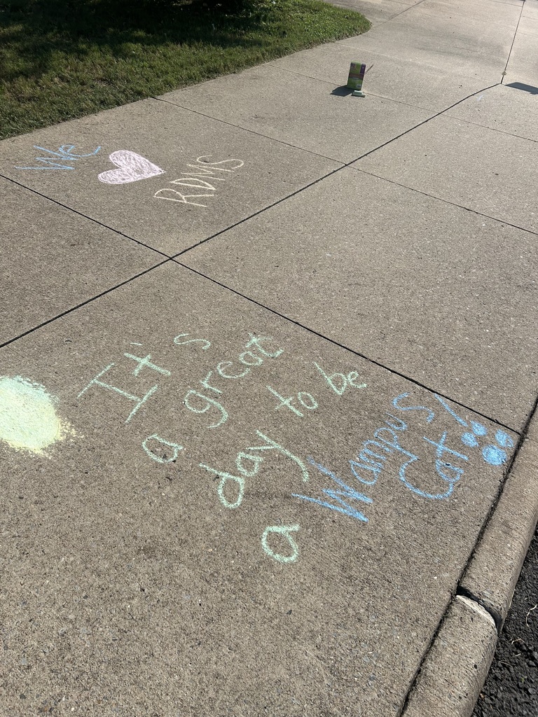 students using sidewalk chalk