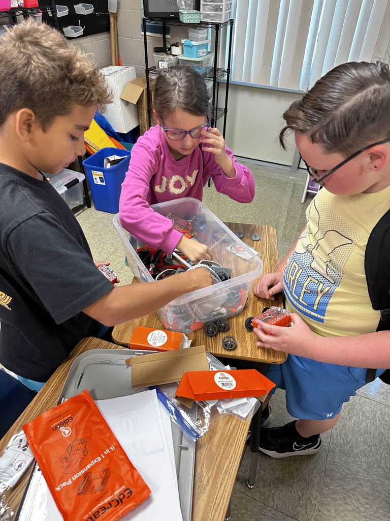 Students coding for robots