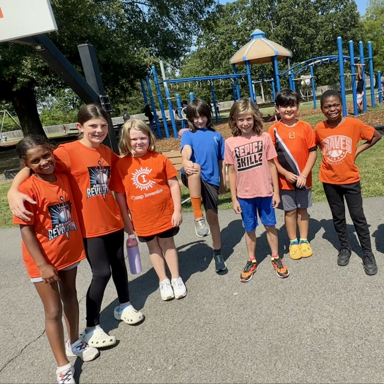 fourth grade students supporting kindergarten by wearing orange
