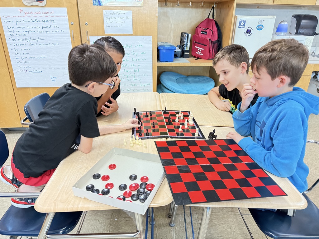 students playing board games