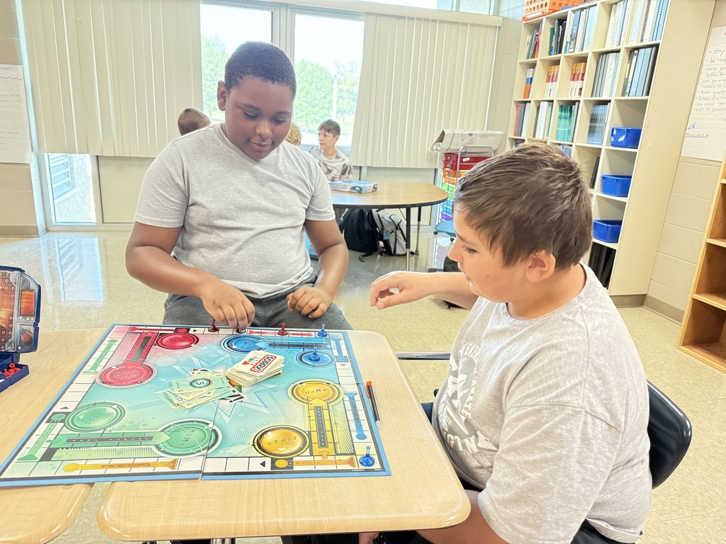 students playing board games