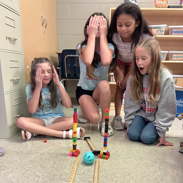 students building together 