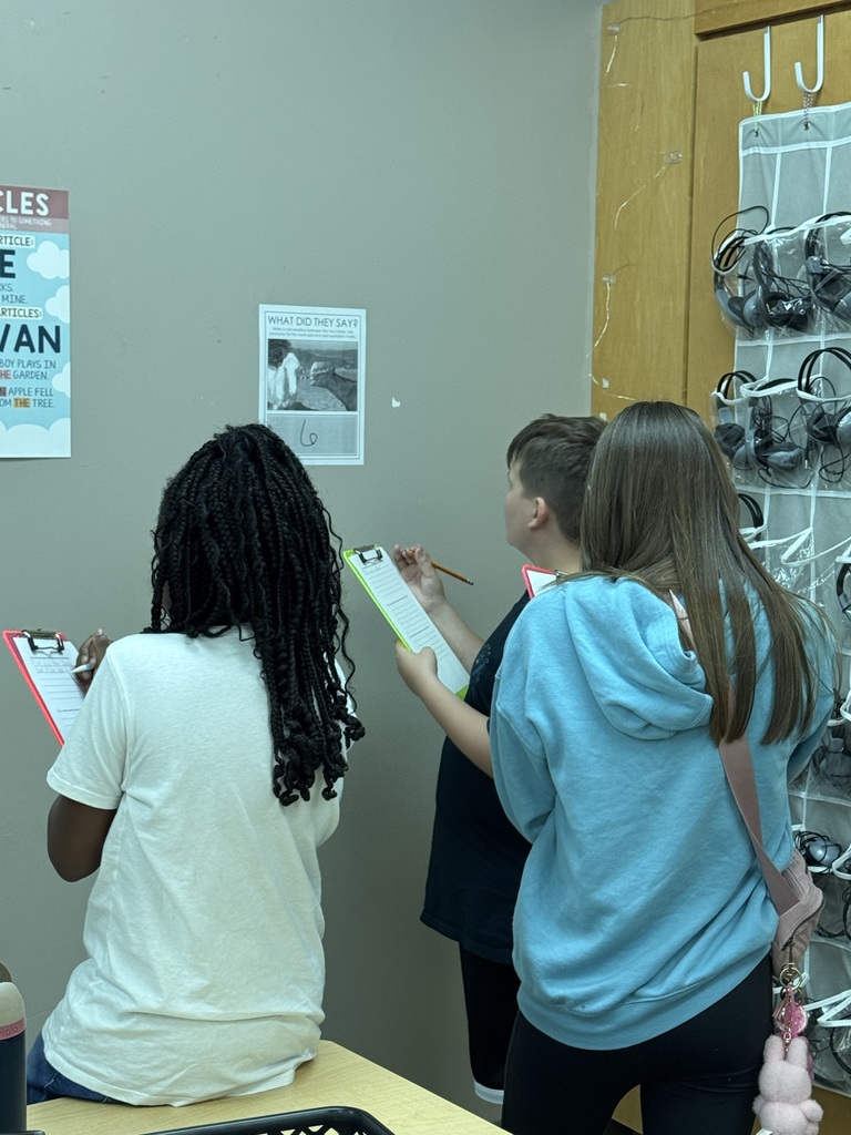 students writing about animals