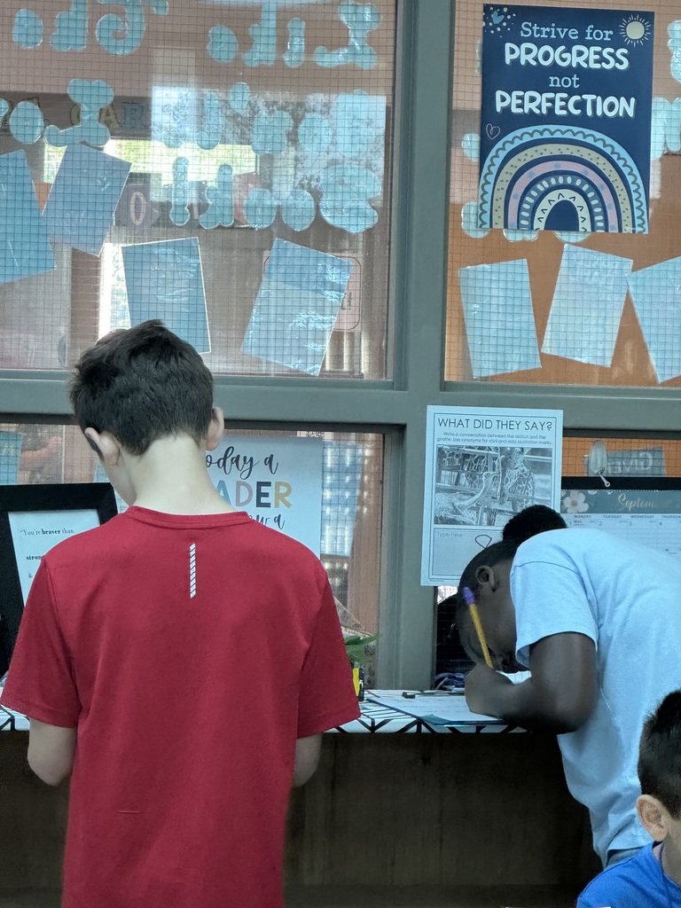 students writing about animals