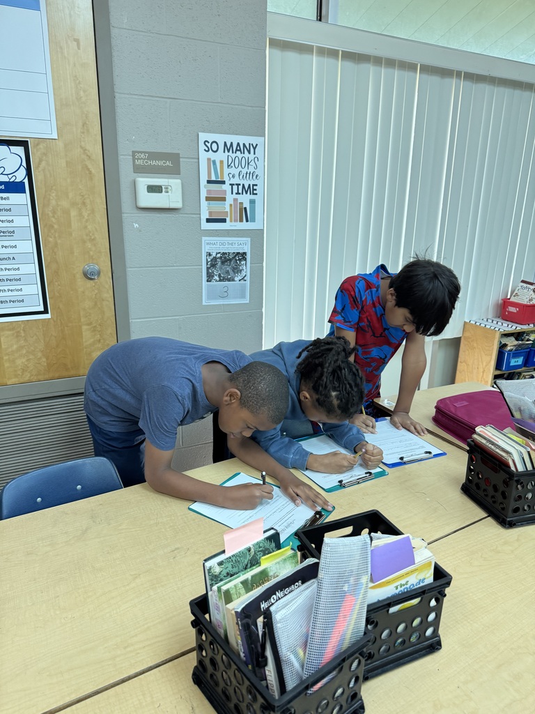 students writing about animals