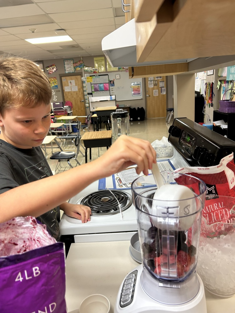 students making smoothies