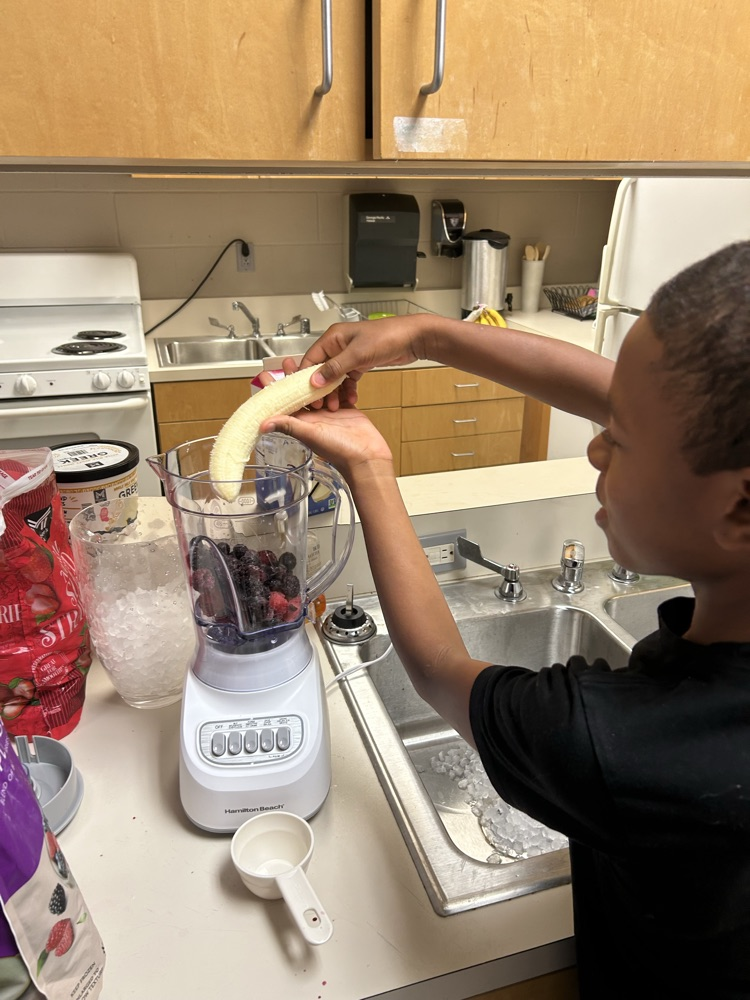 students making smoothies