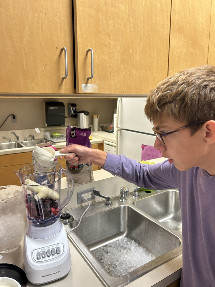 students making smoothies
