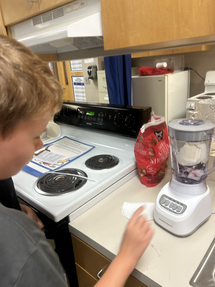 students making smoothies
