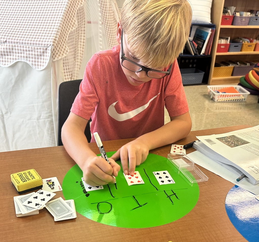 💡2nd graders are showing off their place value skills with number cards in small groups and centers today!