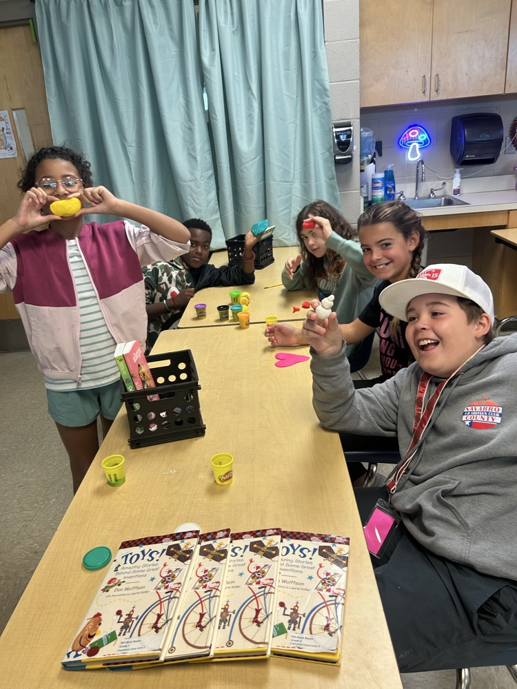 students reading and playing games