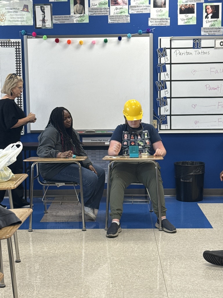 A pair of students playing the word game "taboo".