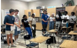 Groups of students working on collecting data.