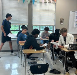 Groups of students working on collecting data.