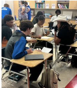 Groups of students working on collecting data.