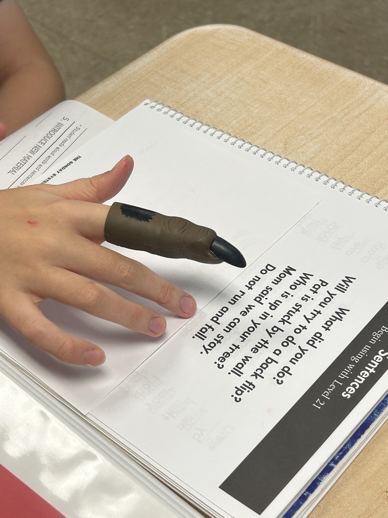 Students practicing tracing words