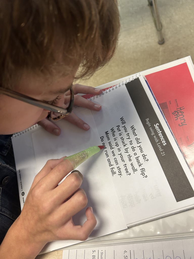 Students practicing tracing words