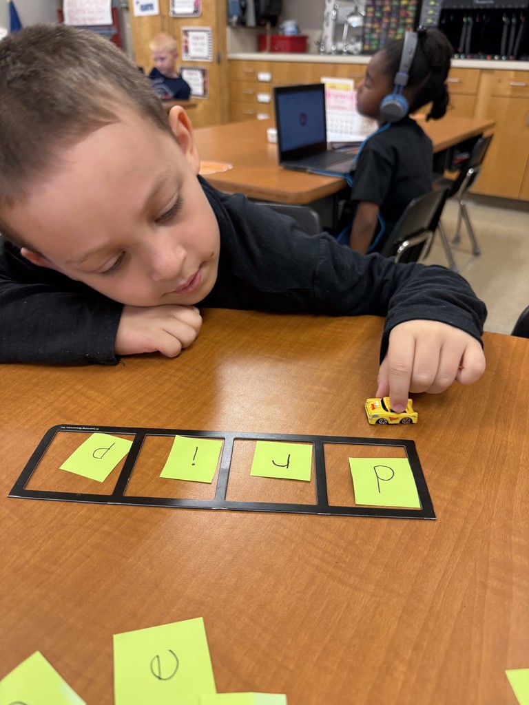 Building words and blending the sounds with a race car sure makes reading fun! 