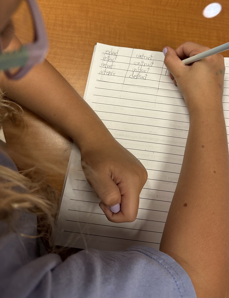 Our third graders love teaming up to build word chains during phonics!