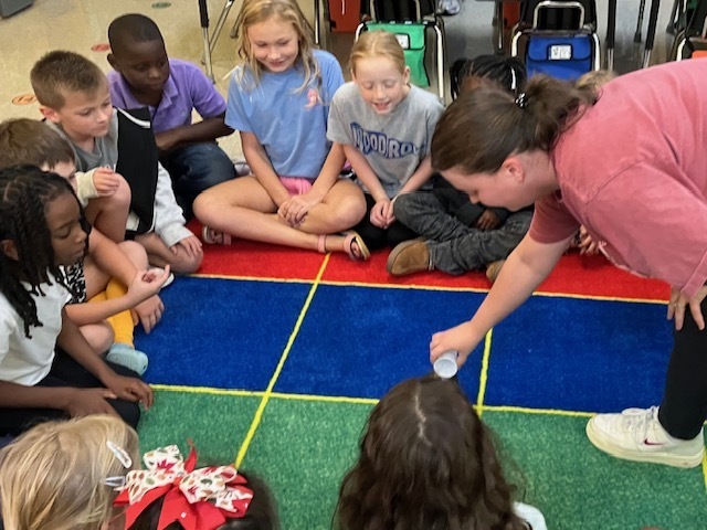 These Jr. Scientists in Mr. Smith's class were “overflowing” with questions as they observed what happens when vinegar and baking soda are mixed together!  Such a fun science experiment with Mrs. Julie, our speech teacher!