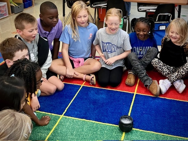 These Jr. Scientists in Mr. Smith's class were “overflowing” with questions as they observed what happens when vinegar and baking soda are mixed together!  Such a fun science experiment with Mrs. Julie, our speech teacher!
